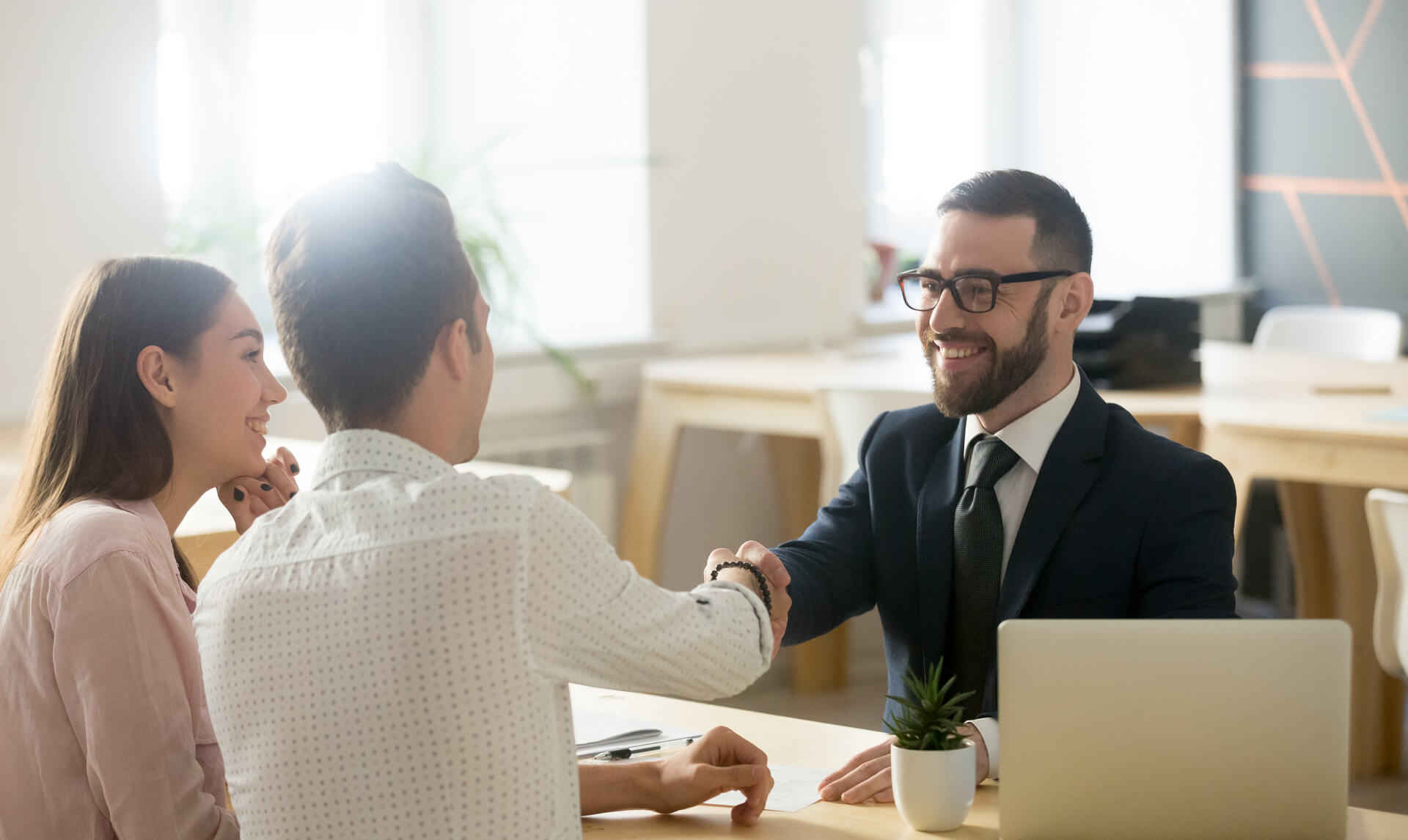 A couple meeting with a financial planner.