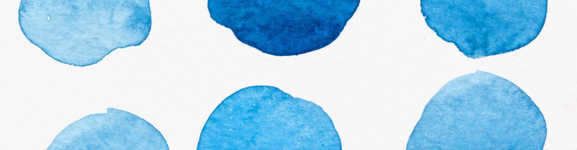 A set of six watercolour blue circles in different shades