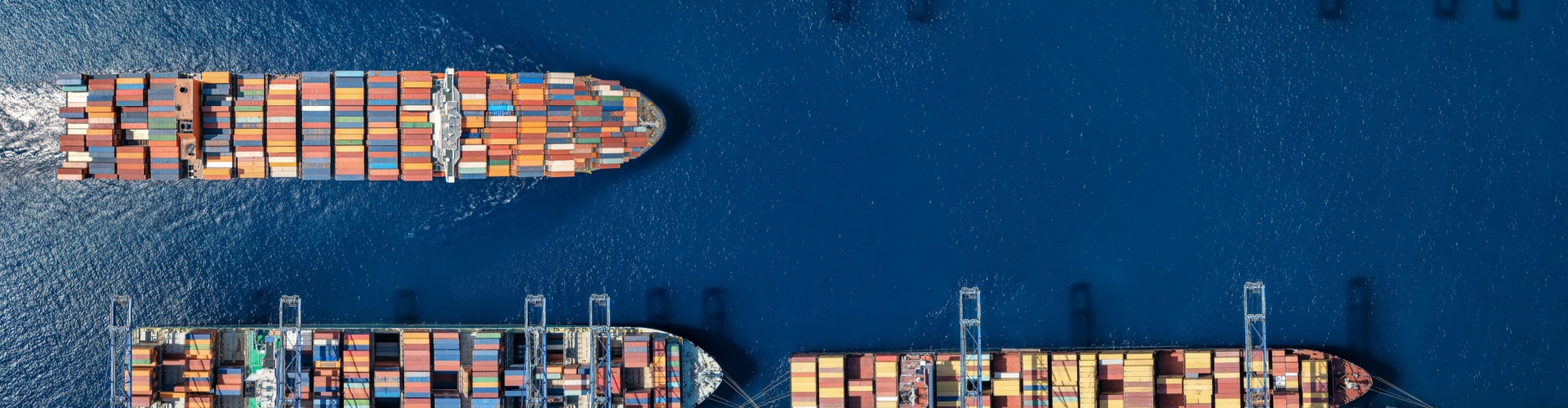 An aerial view of a cargo ship harbour.